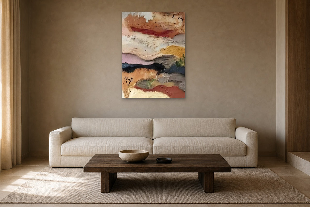 Desert Strata shown at 70 × 100 cm above a 230 cm linen sofa