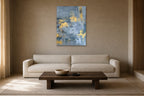Blue and Saffron shown at 70 × 100 cm above a 230 cm linen sofa