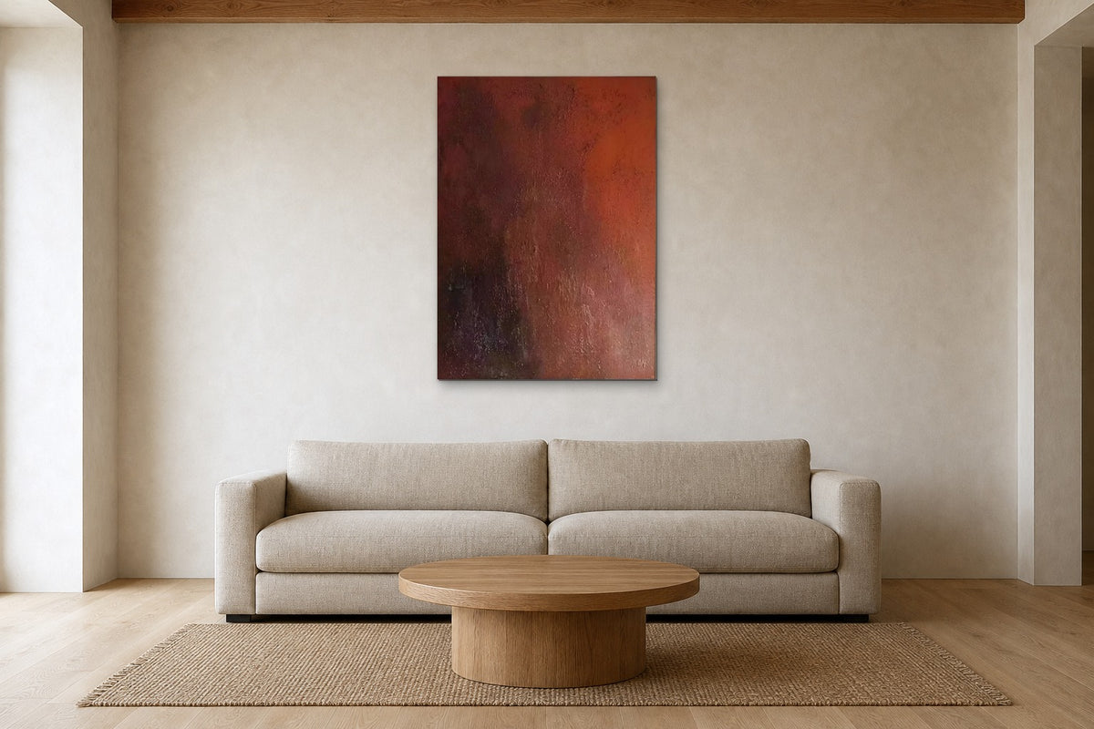 Rust Dusk shown at 80 × 120 cm above a 240 cm linen sofa