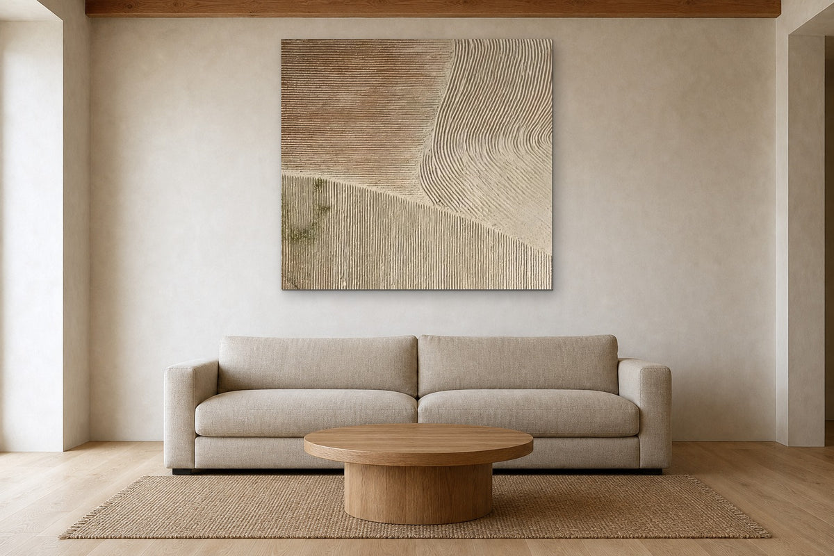 Combed Sand shown at 130 × 130 cm above a 240 cm linen sofa