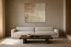 Combed Sand shown at 100 × 100 cm above a 230 cm linen sofa