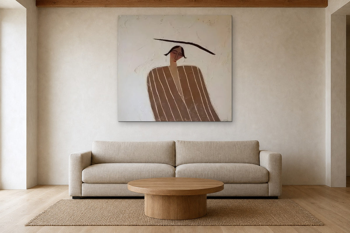 The Balancing Woman shown at 130 × 130 cm above a 240 cm linen sofa