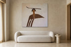 Woman with a Branch shown at 140 × 140 cm above a 220 cm boucle sofa